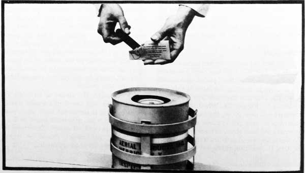 Figure 28-Removing the Match from the Envelope