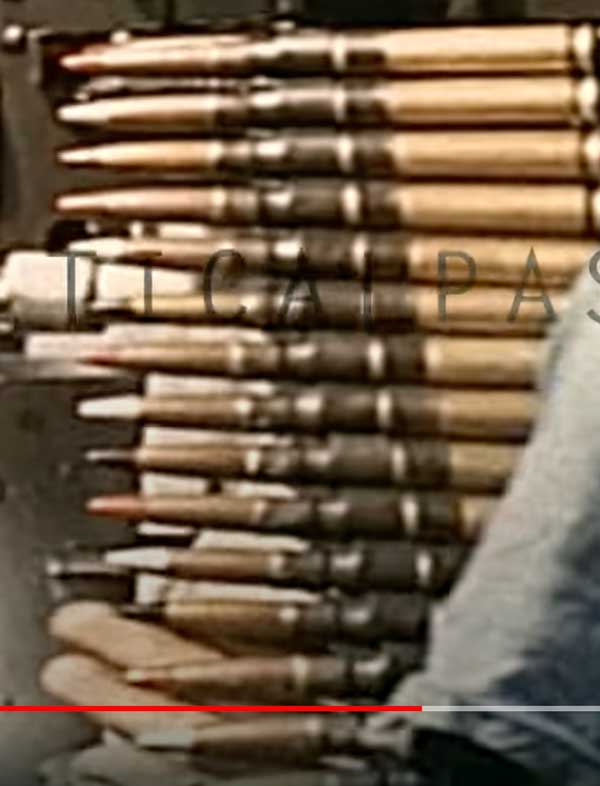 belt of ammunition with different colors on the tips.