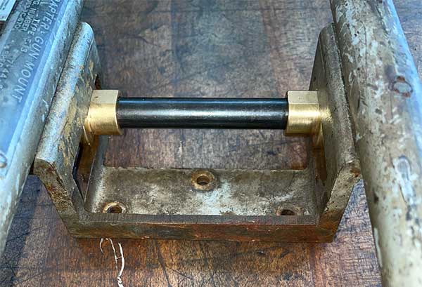 rear trunnion support with cut area